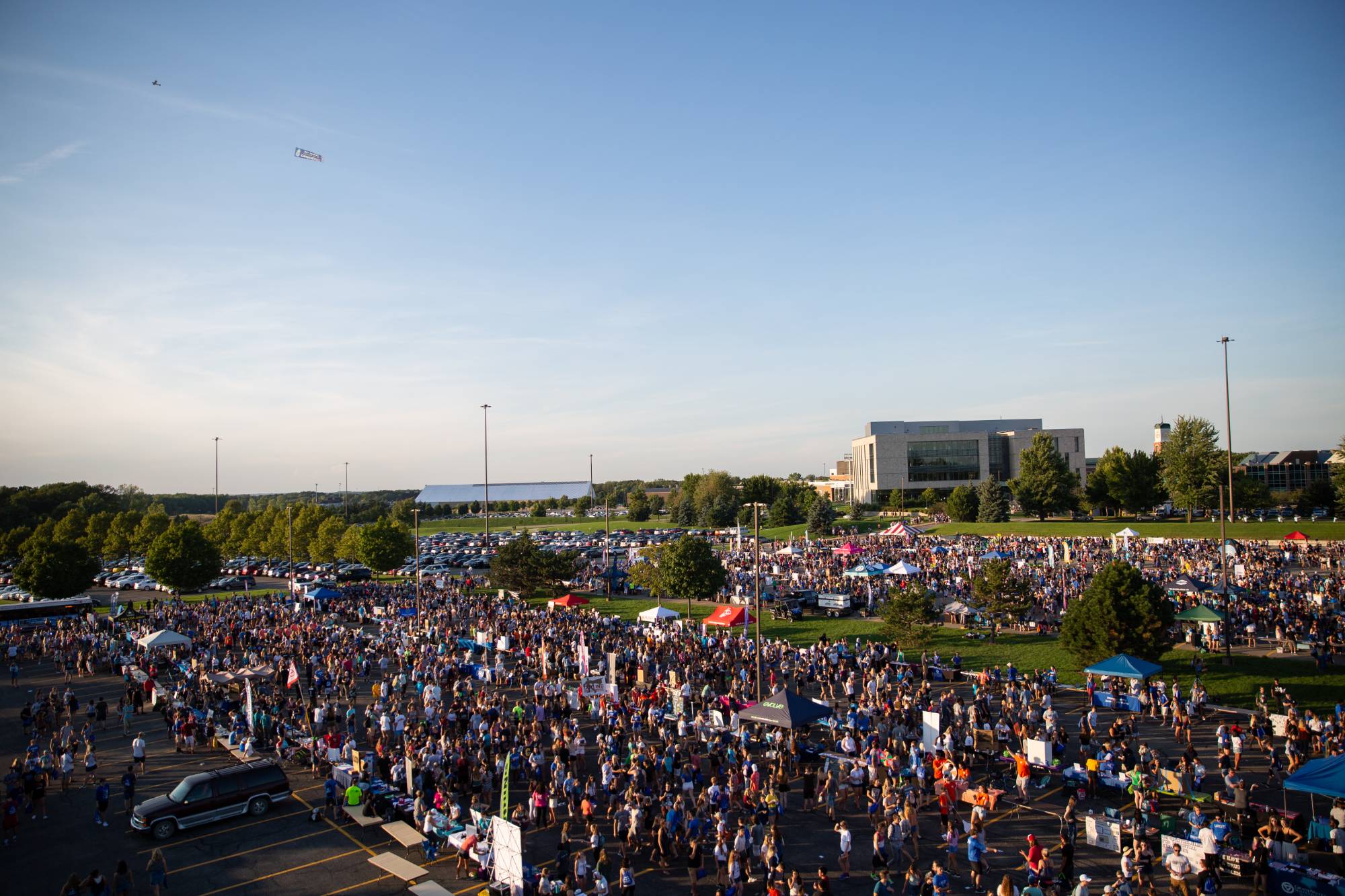 Overhead shot of a crowded parking lot at Campus Life Night